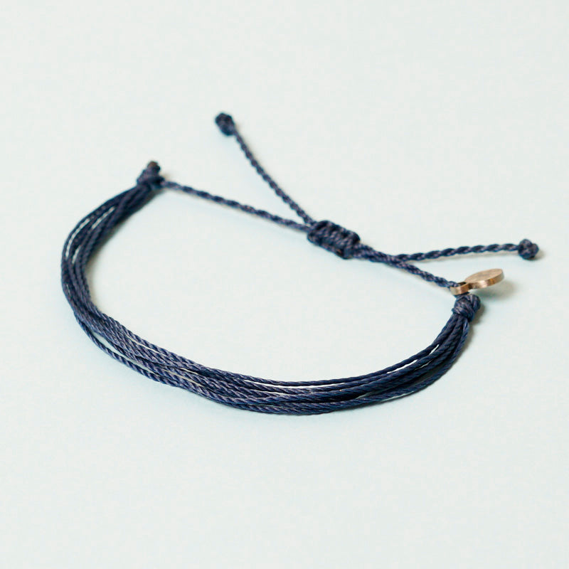 PULSERA AJUSTABLE HILO ENCERADO “COSMICA ORIGINAL AZUL MAR"