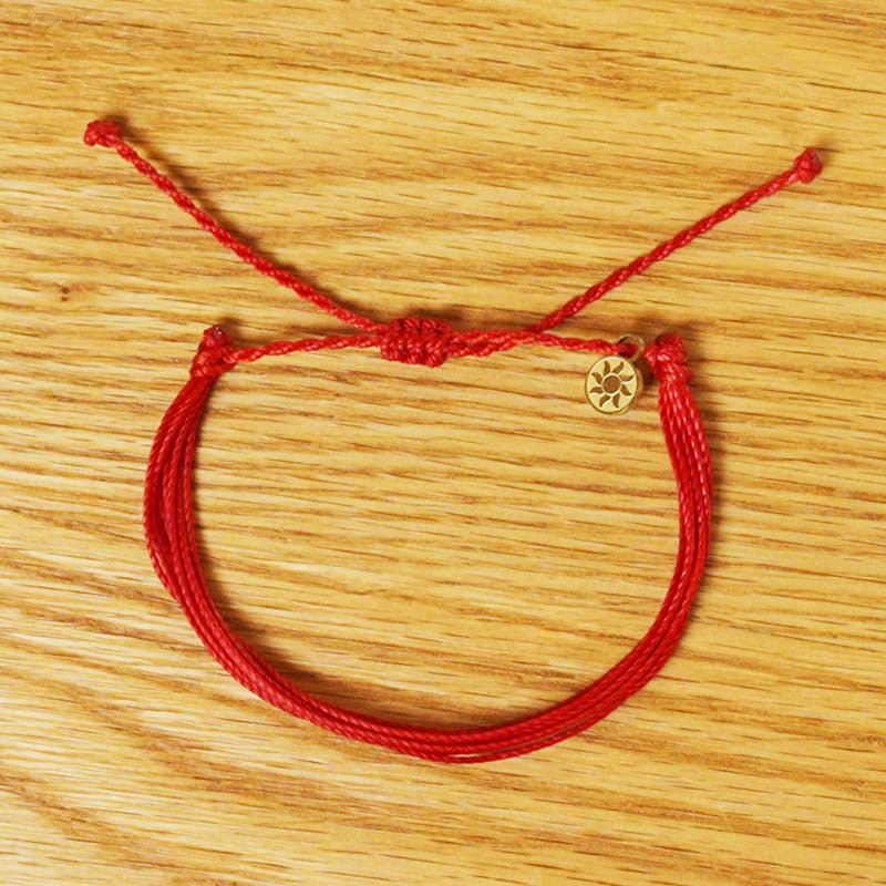 PULSERA AJUSTABLE HILO ENCERADO “COSMICA ORIGINAL ROJO”